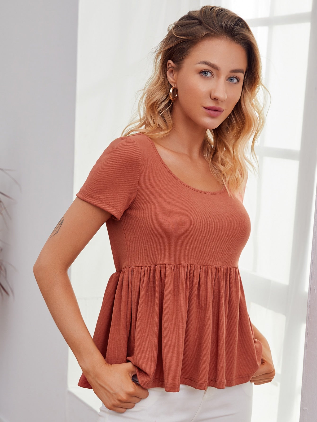 Solid Ruffle Hem Peplum Tee