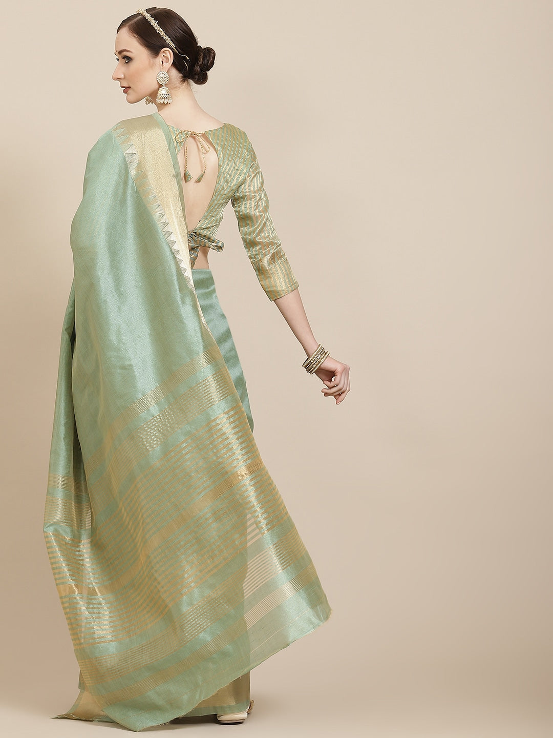 Green & Golden Solid Woven Design Saree