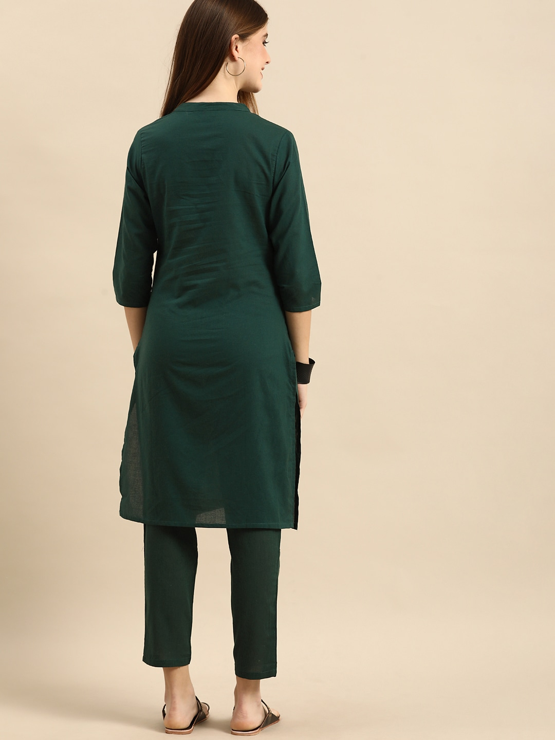 Women Green Solid Kurta with Trousers