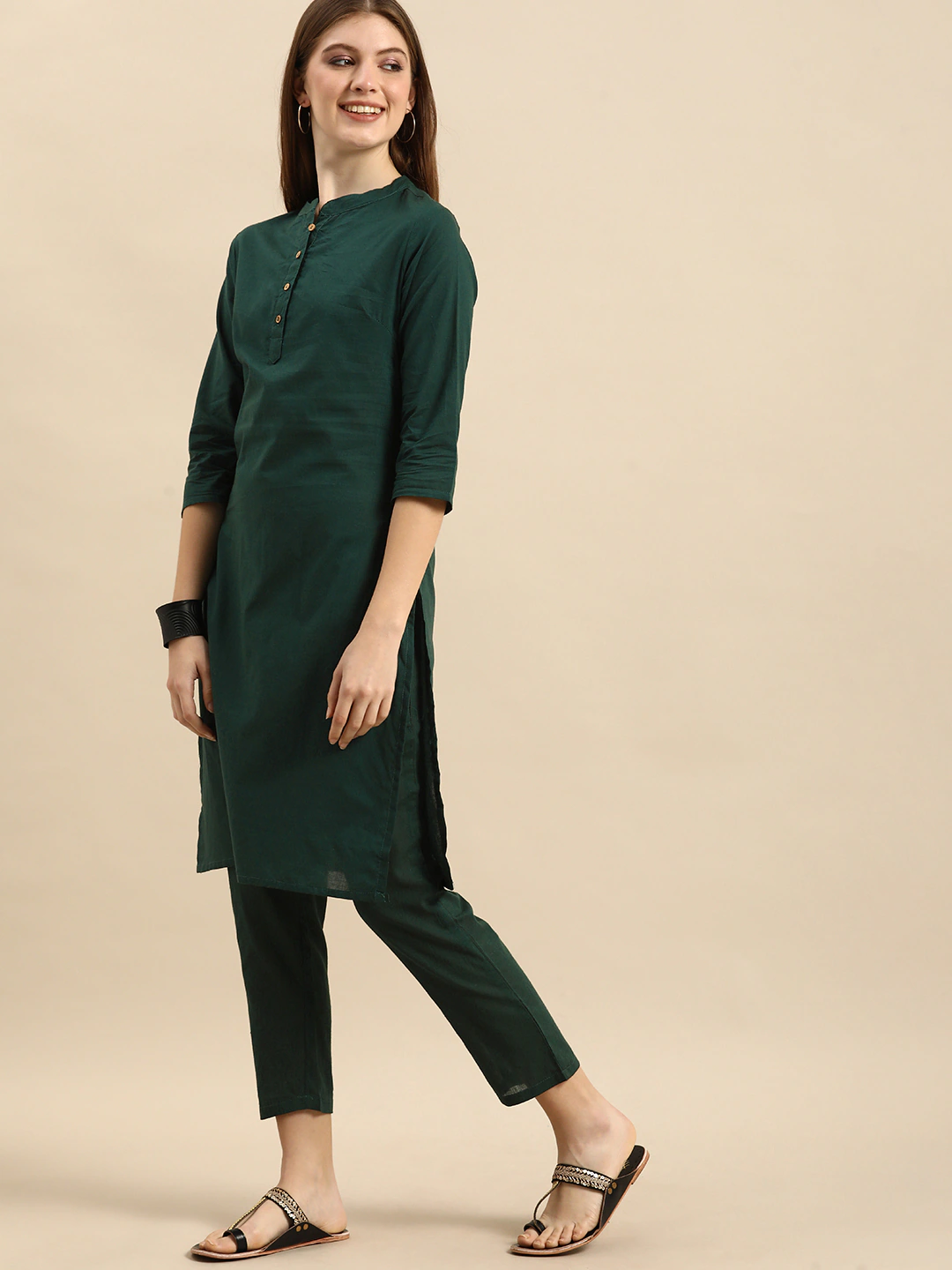 Women Green Solid Kurta with Trousers