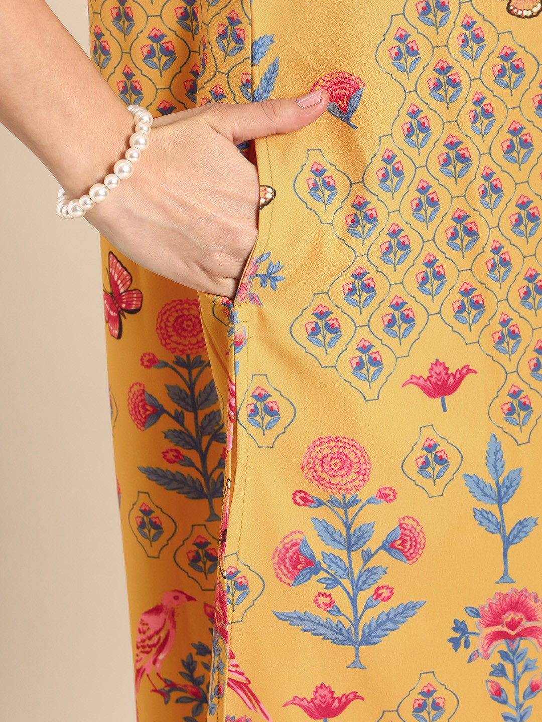 Women Mustard Yellow Floral Printed A- Line Kurta with Trousers