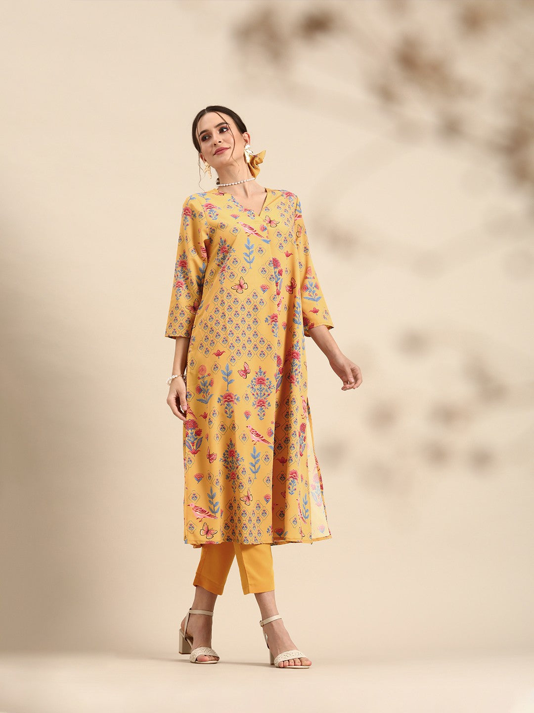 Women Mustard Yellow Floral Printed A- Line Kurta with Trousers