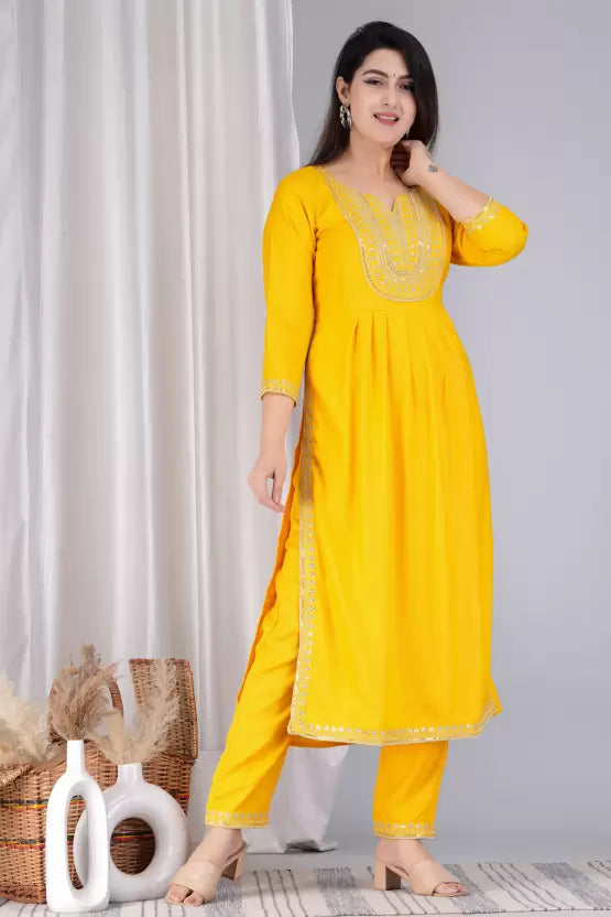 Women Nyra-cut Rayon Kurta set with embroidered Yoke