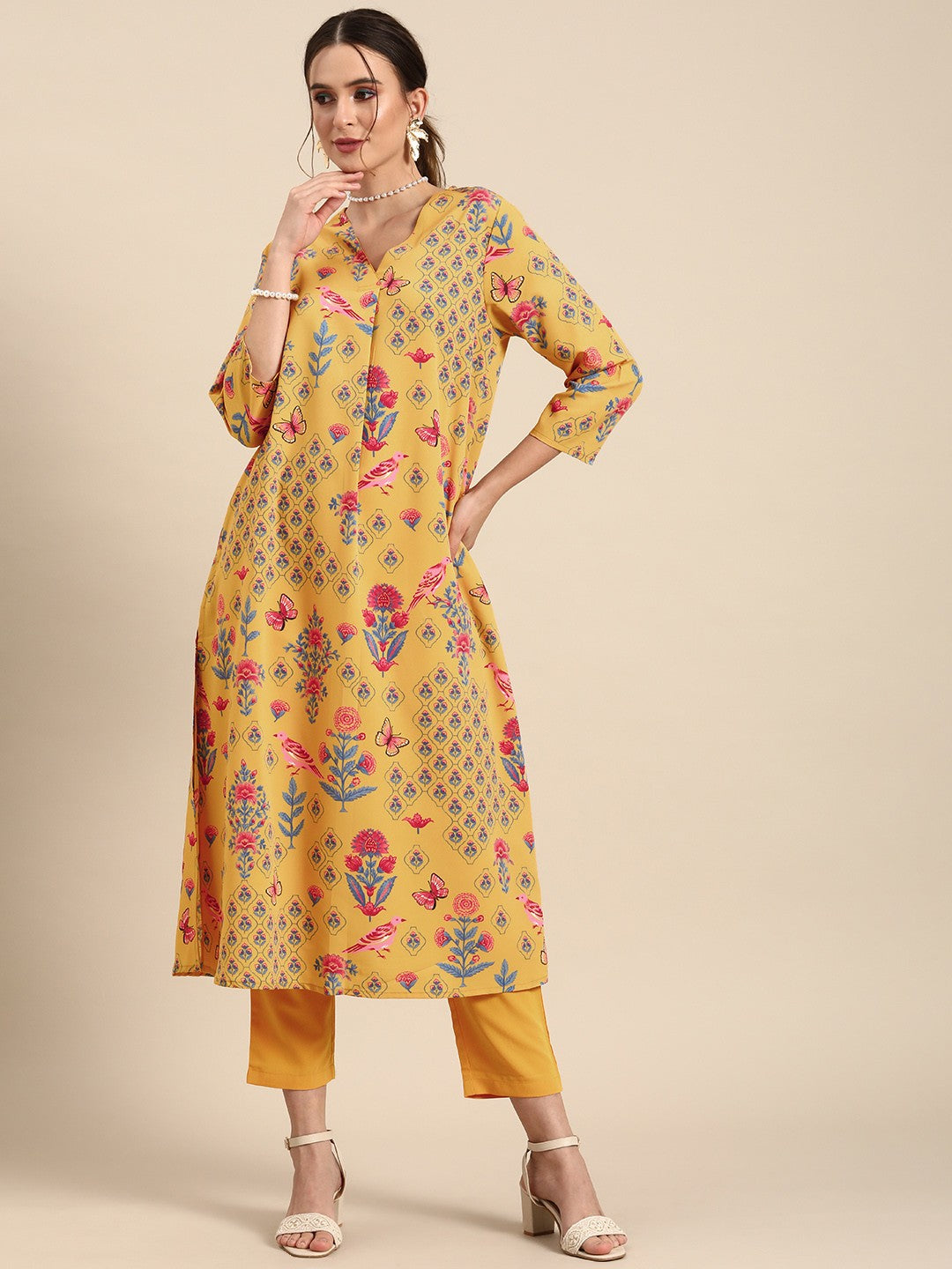 Women Mustard Yellow Floral Printed A- Line Kurta with Trousers