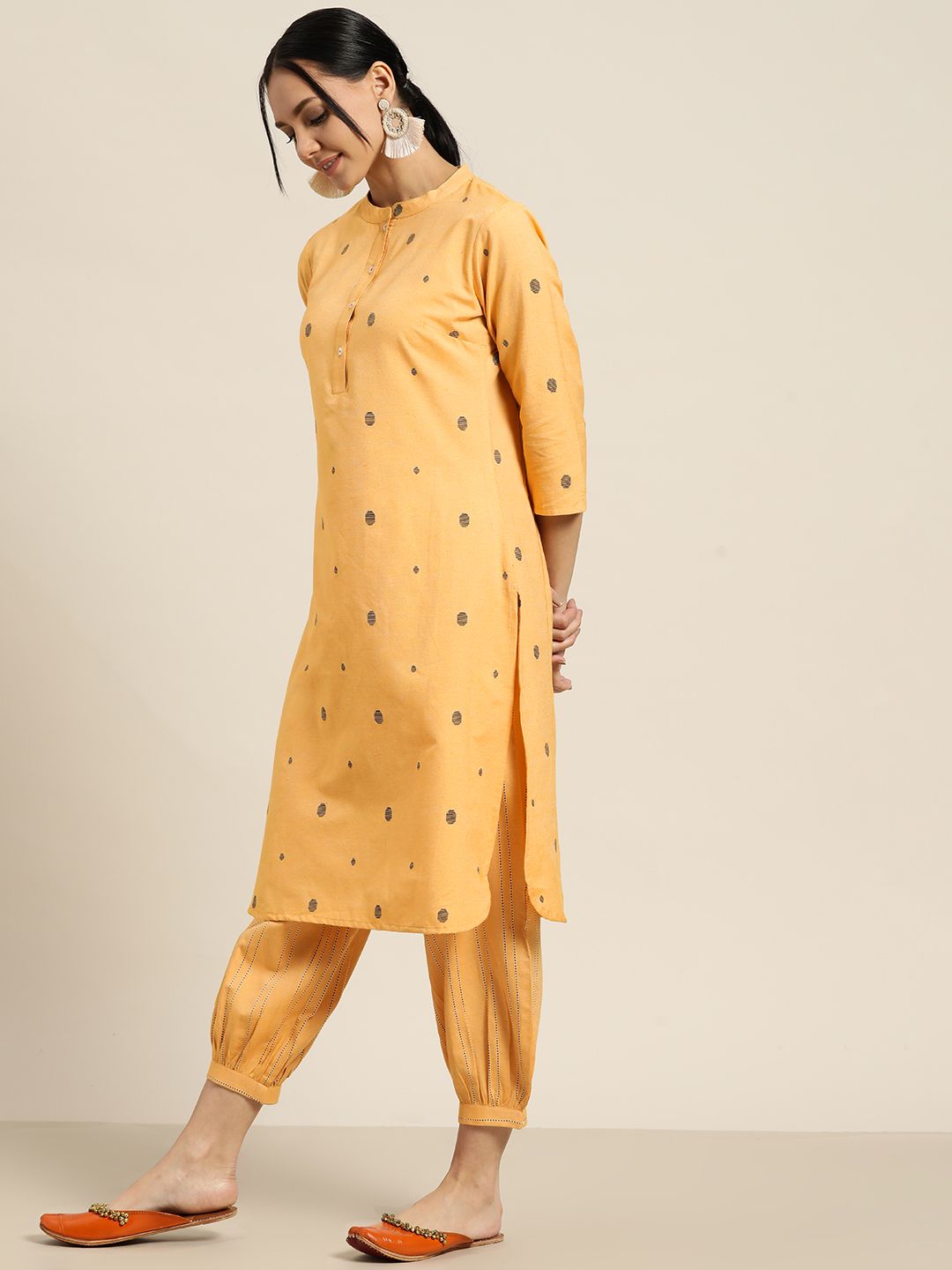 Women Yellow & Black Woven Design Regular Kurta with Salwar