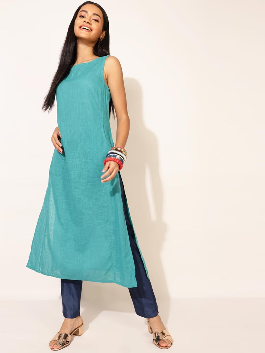 Women Turquoise Blue Thread Work Kurta with purple palazzo