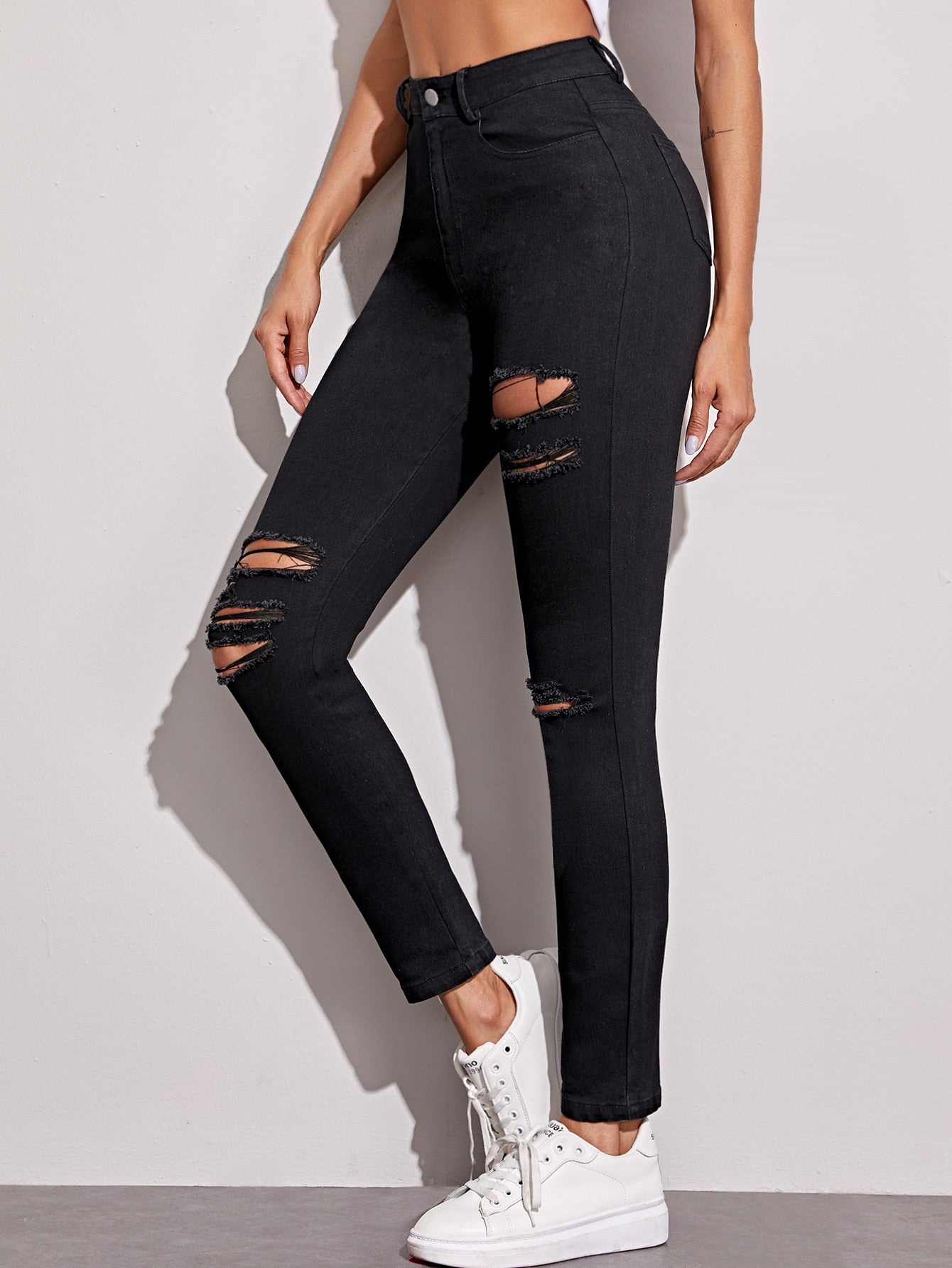 Ripped Button Fly Skinny Jeans