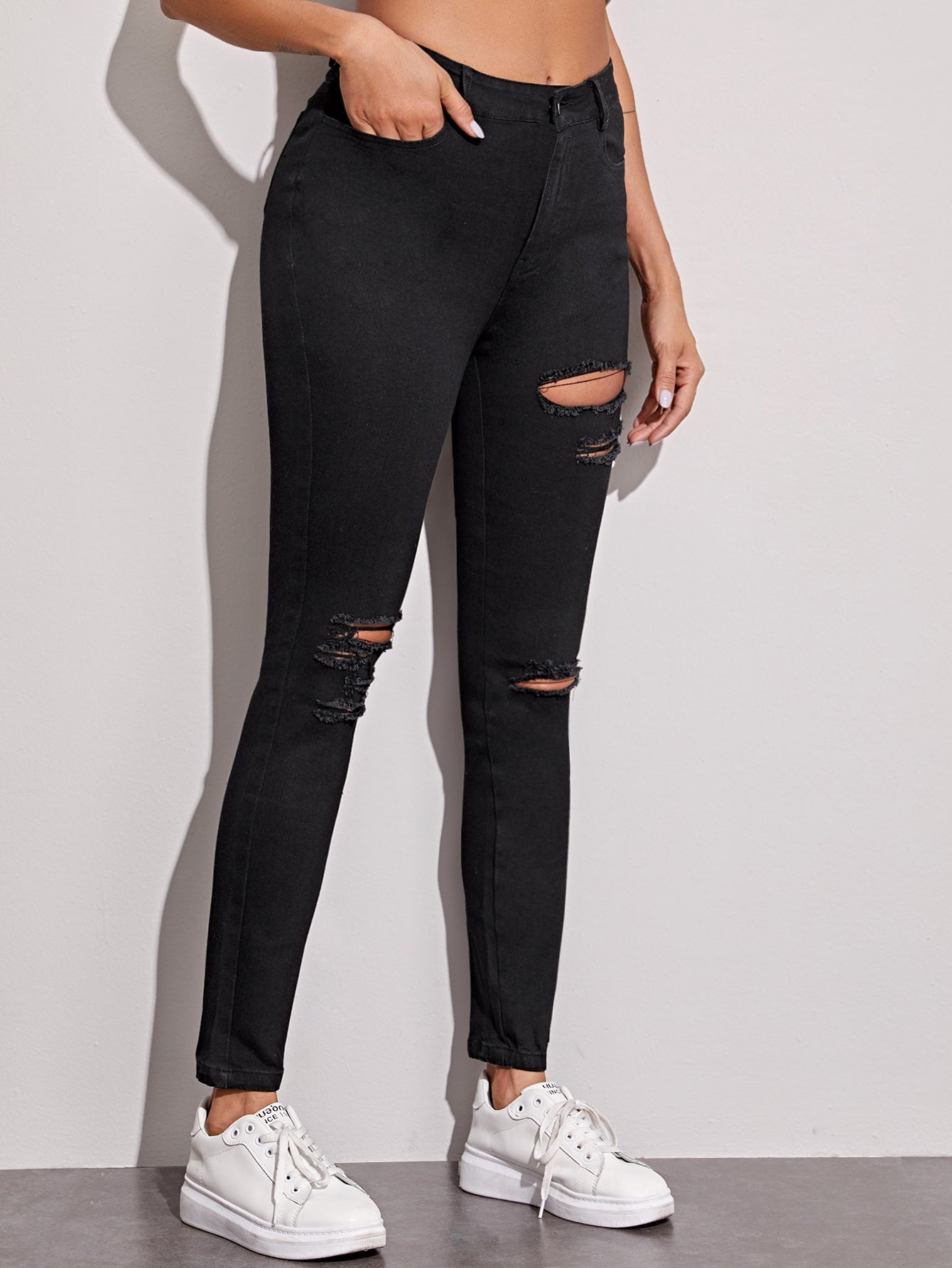 Ripped Button Fly Skinny Jeans