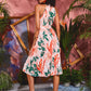 Tropical Print Pleated Hem Belted Halter Dress