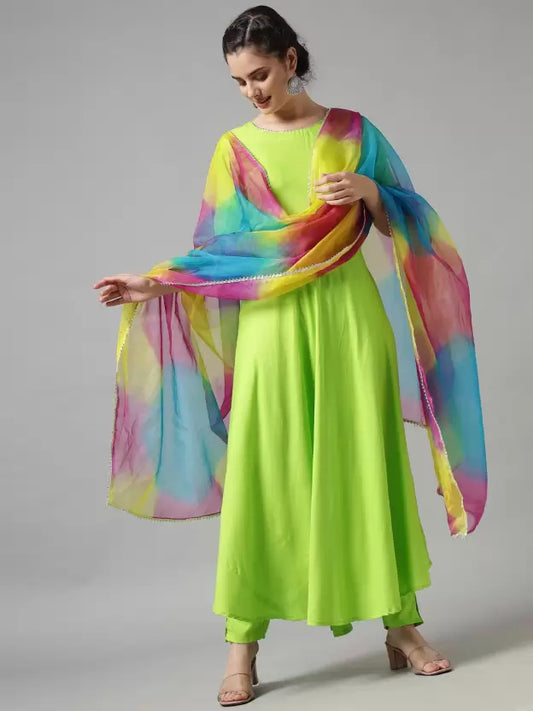 Women Viscose Rayon Green Kurta, Pant And Dupatta Set with colorful shawl